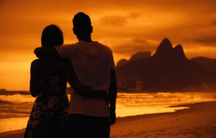 A couple on the beach in Rio de Janeiro