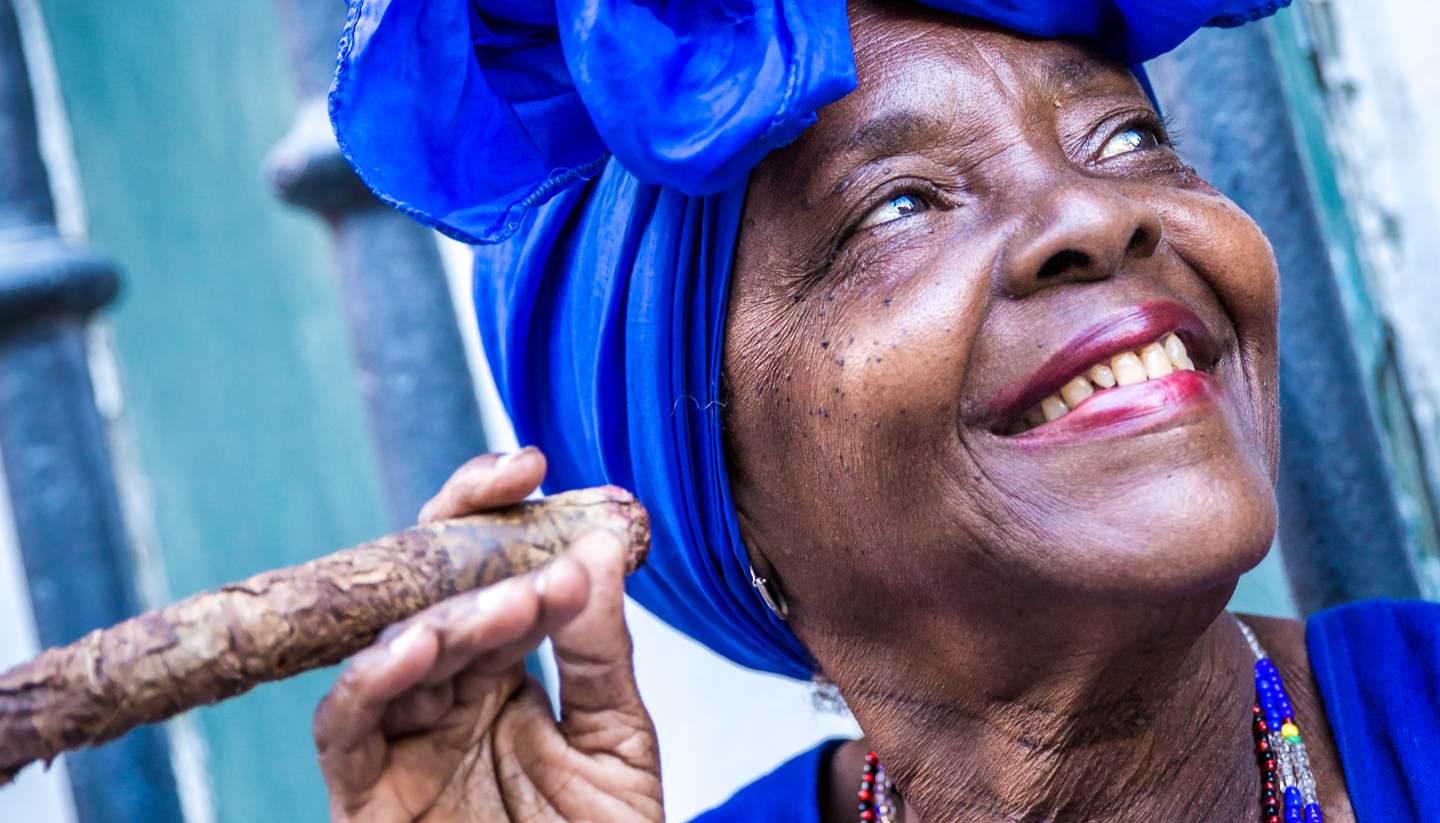 24 hours in: Havana - Portrait of cuban woman smoking cigar in Havana, Cuba