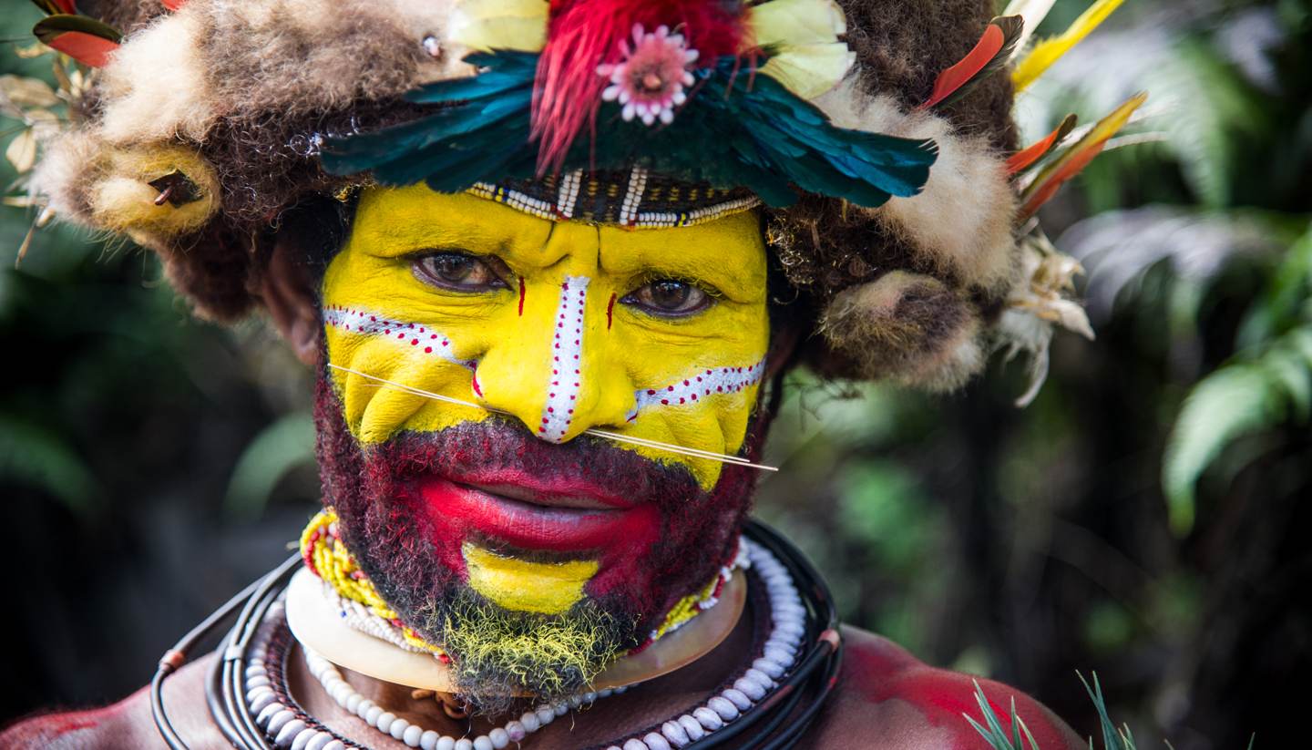 Top 5: Culture shock holidays - Huli man ready for local singsing (festival)