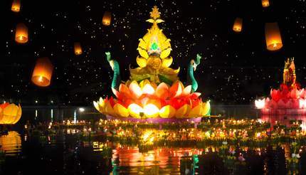 Boats with candles and flowers