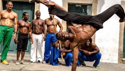 Men playing Capoeira