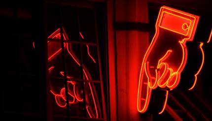 Neon sign in Seattle at night