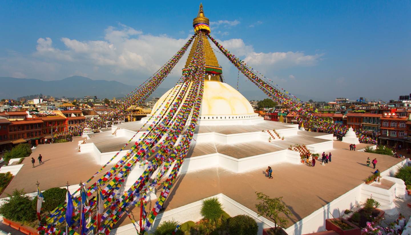 City Highlight: Kathmandu - People dotted around the Boudhanath stupa in Kathmandu