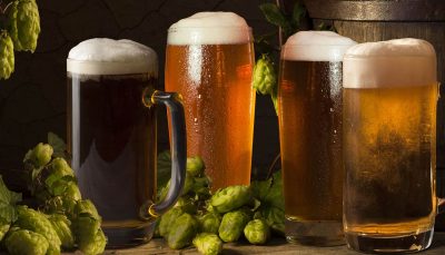 Cold beer in pint glasses lined up