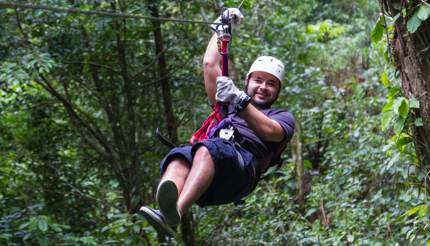 Zip lining in the Malolotja treetops