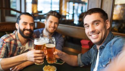Three men drinking craft beer