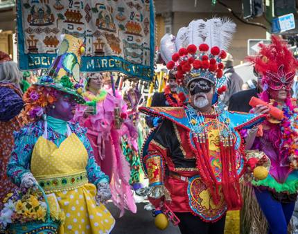 Participants in elaborate costumes