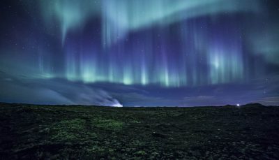 Aurora over a lava field
